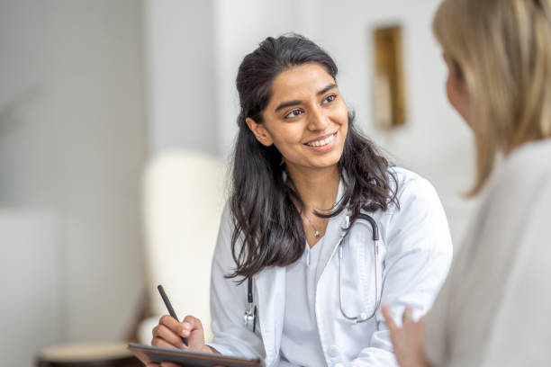Physician speaking with a patient